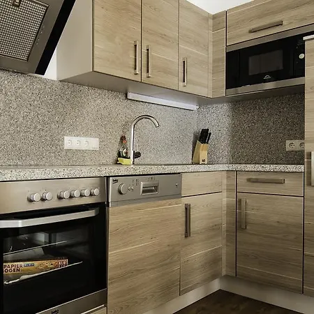 斯拉德明城市之屋公寓